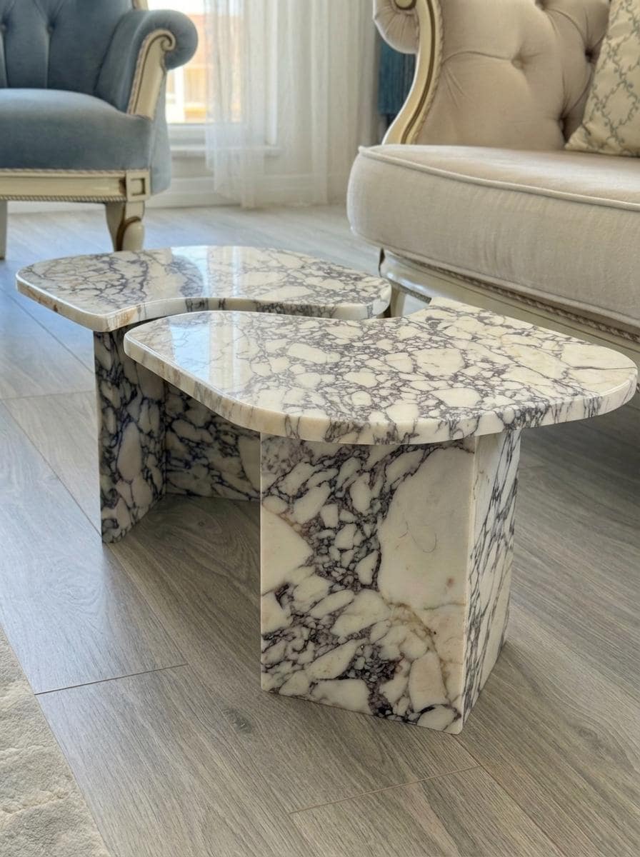 Calacatta Viola live edge marble coffee table in a living room