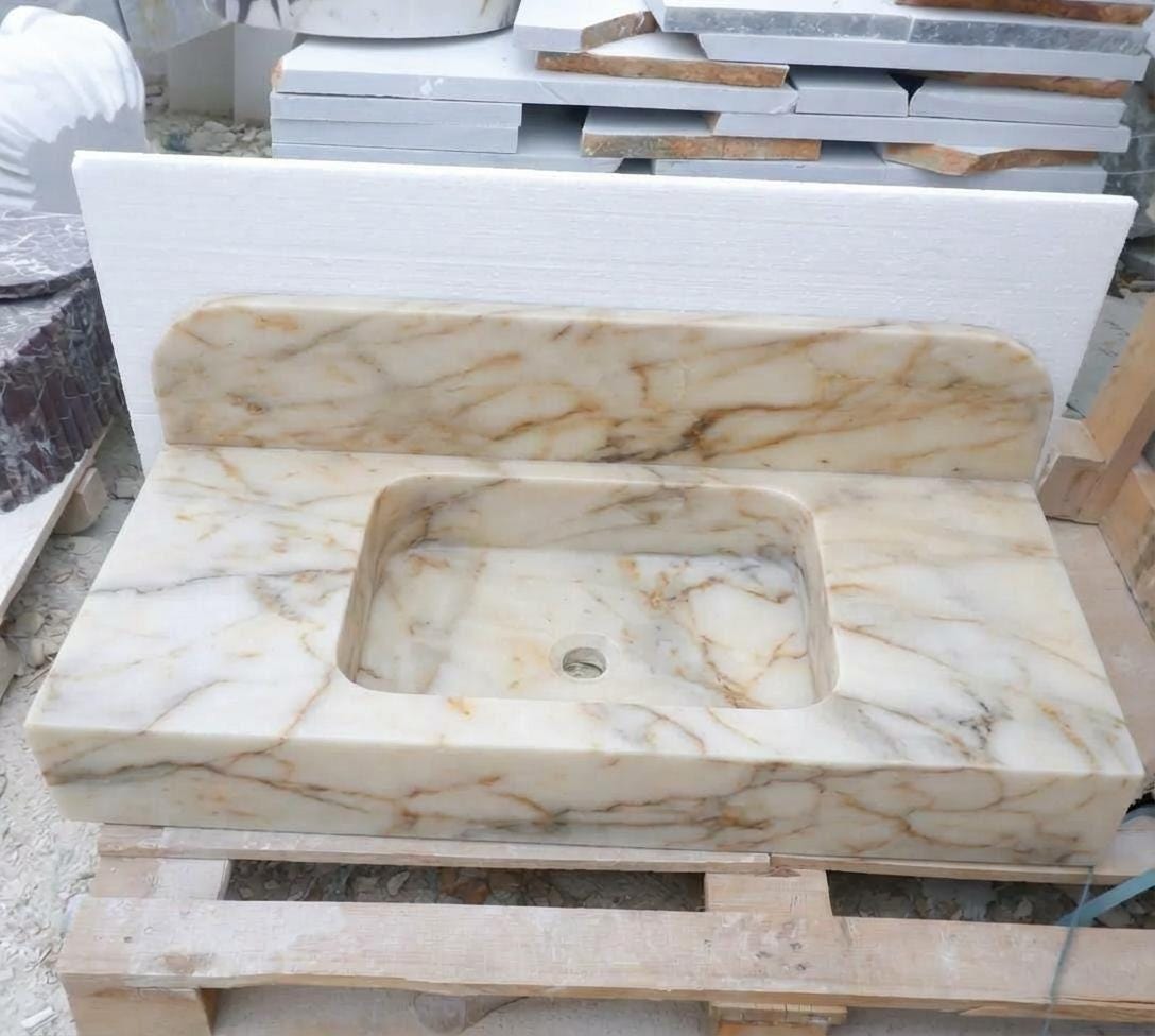 Handcarved Calacatta Gold marble floating vanity sink by Marblyart, custom made to order — photo 8 of 14