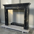 Handcarved Nero Marquina marble fireplace mantel by Marblyart, custom made to order — photo 1 of 11