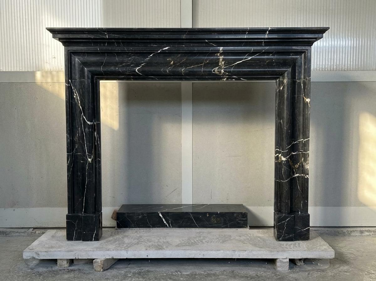 Handcarved Nero Marquina marble fireplace mantel by Marblyart, custom made to order — photo 2 of 11