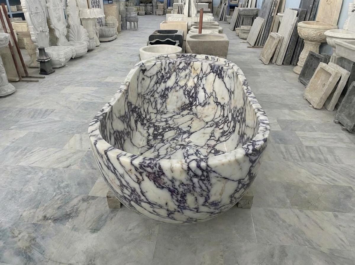 Handcarved Calacatta Viola marble freestanding bathtub by Marblyart, custom made to order — photo 6 of 13
