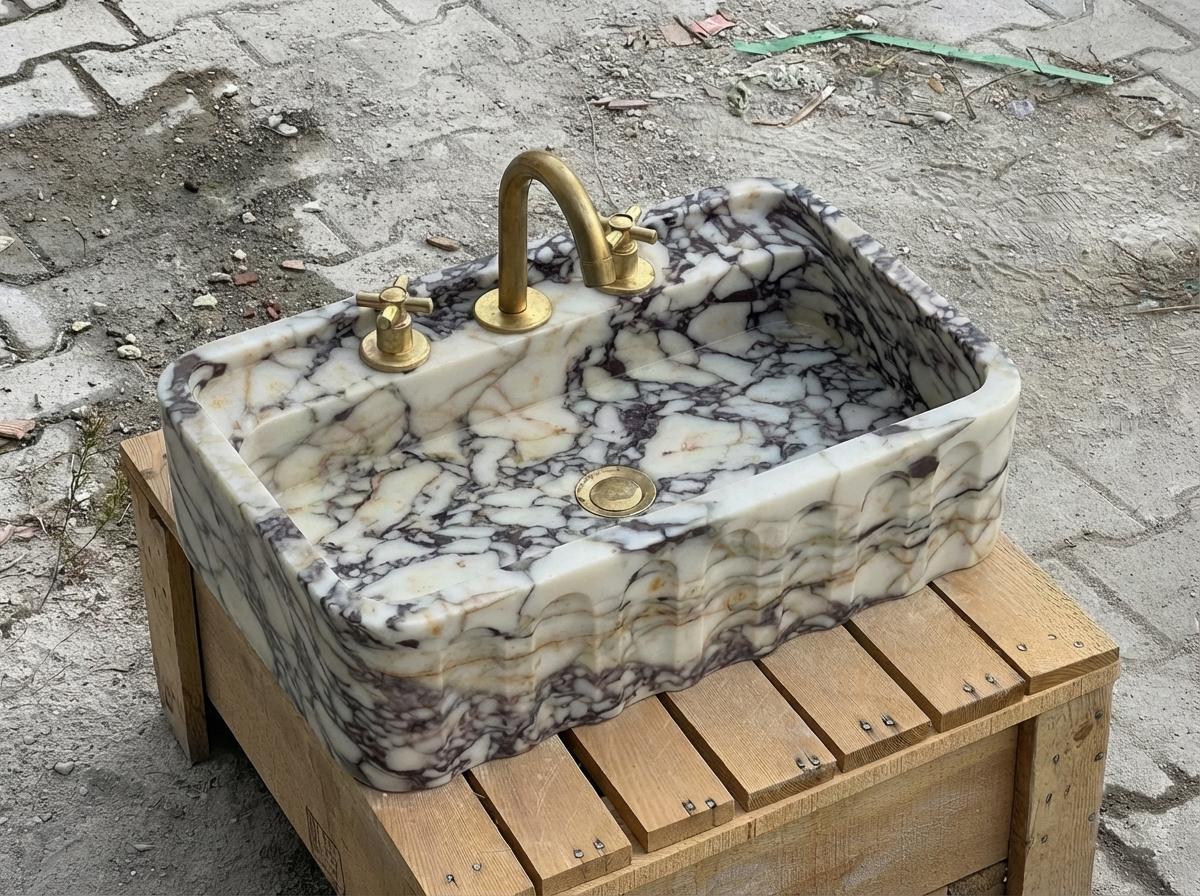 Handcarved Calacatta Viola marble wall mounted sink by Marblyart, custom made to order — photo 11 of 15