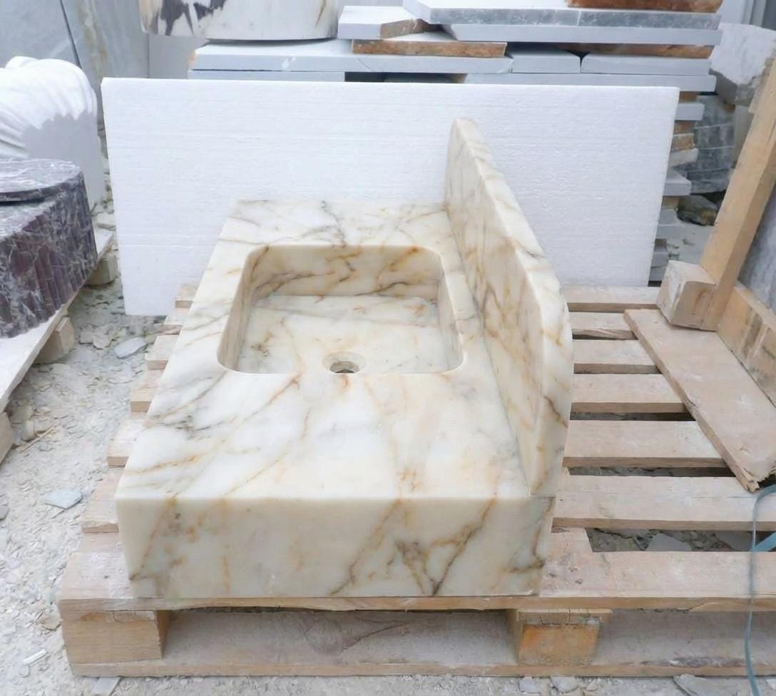Handcarved Calacatta Gold marble floating vanity sink by Marblyart, custom made to order — photo 6 of 14