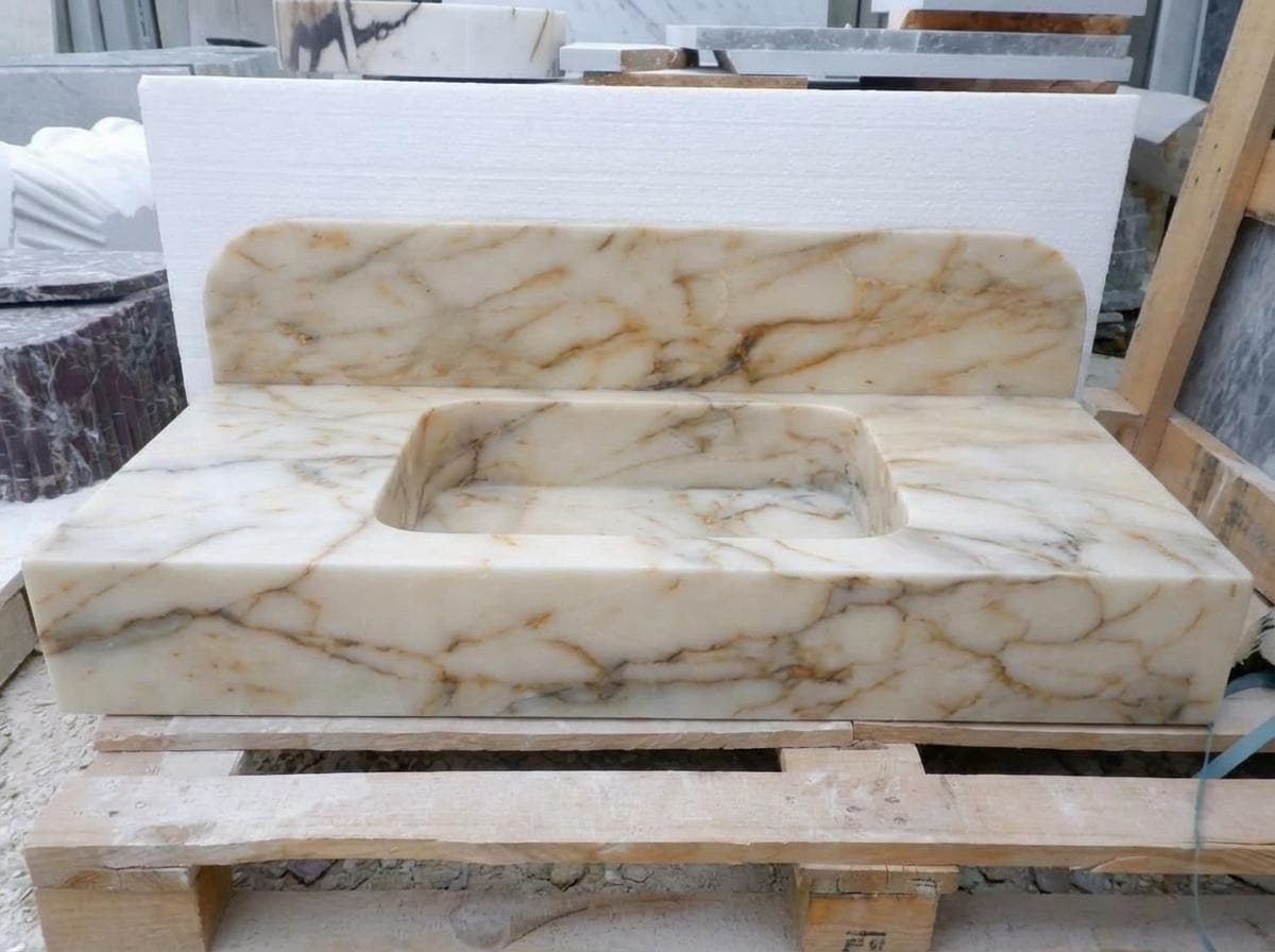 Handcarved Calacatta Gold marble floating vanity sink by Marblyart, custom made to order — photo 10 of 14