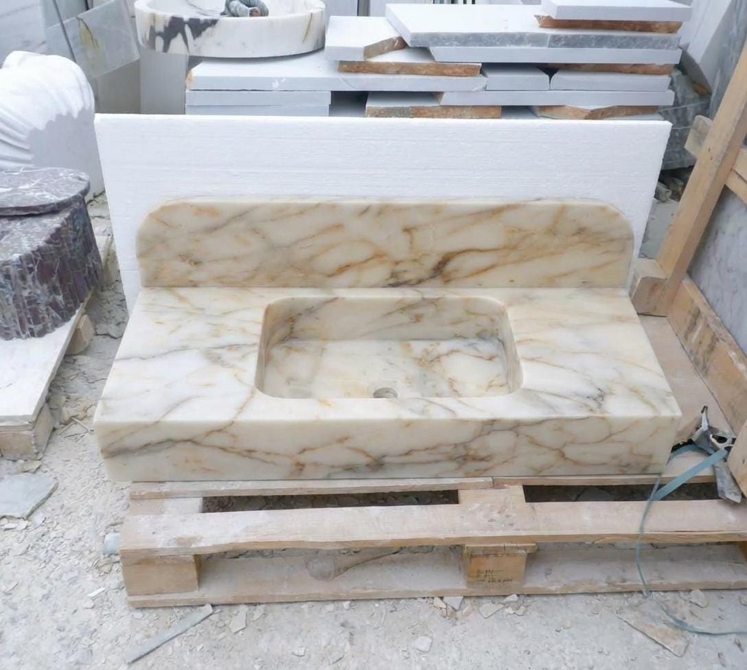 Handcarved Calacatta Gold marble floating vanity sink by Marblyart, custom made to order — photo 11 of 14