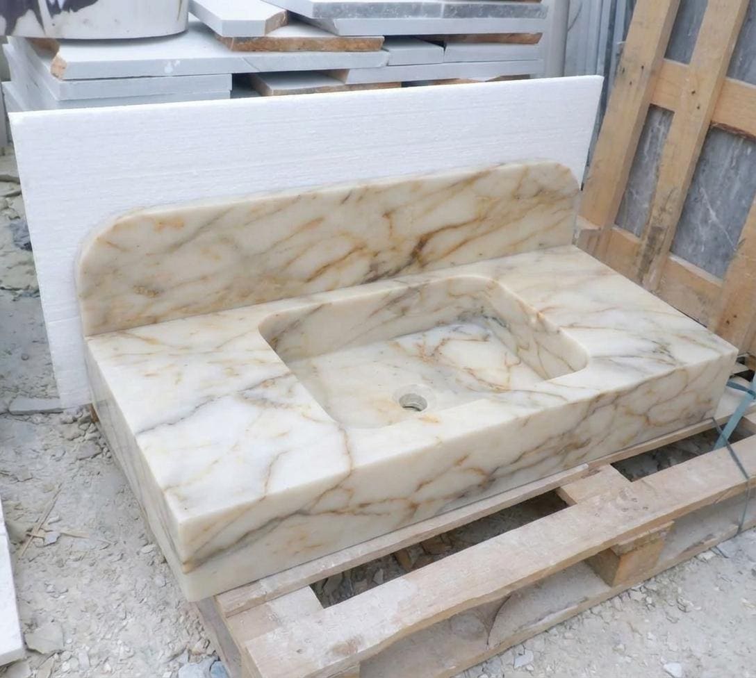 Handcarved Calacatta Gold marble floating vanity sink by Marblyart, custom made to order — photo 12 of 14