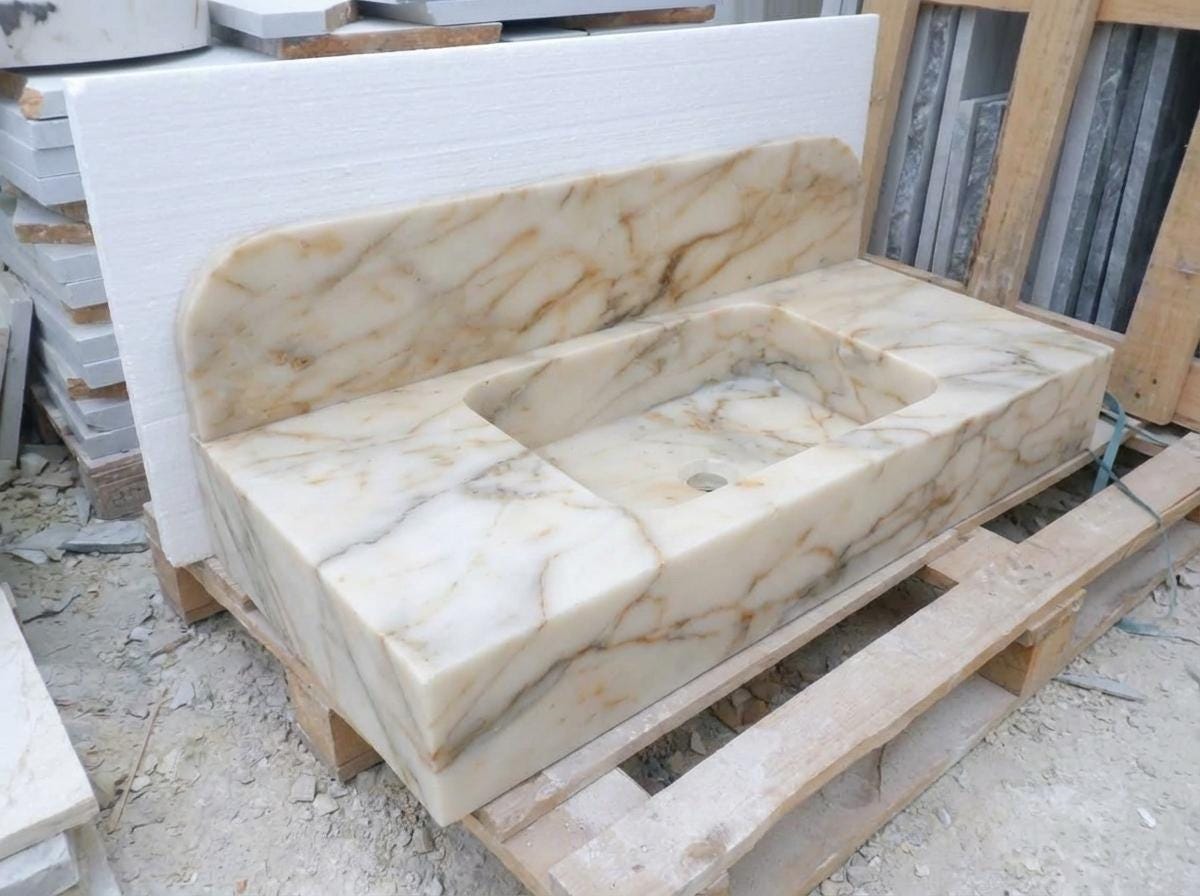 Handcarved Calacatta Gold marble floating vanity sink by Marblyart, custom made to order — photo 2 of 14