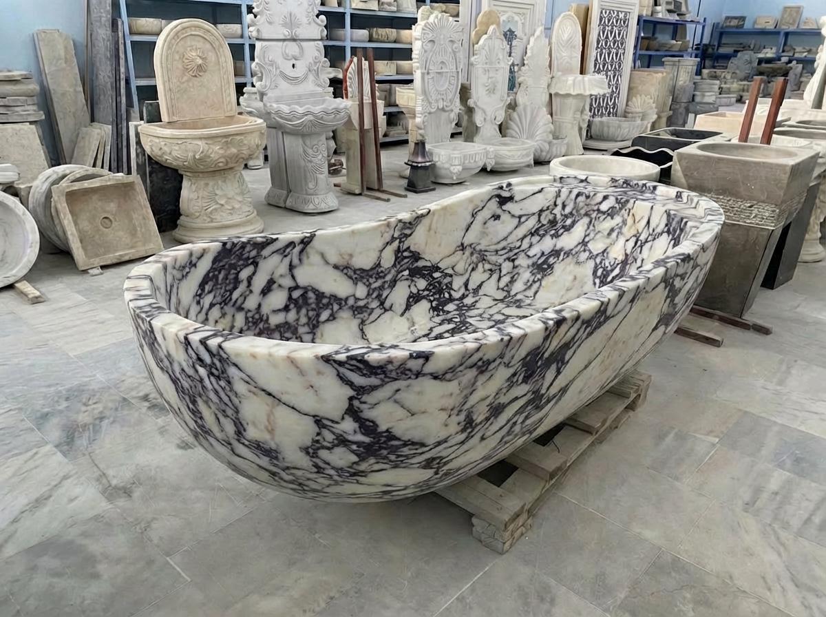Handcarved Calacatta Viola marble freestanding bathtub by Marblyart, custom made to order — photo 4 of 13