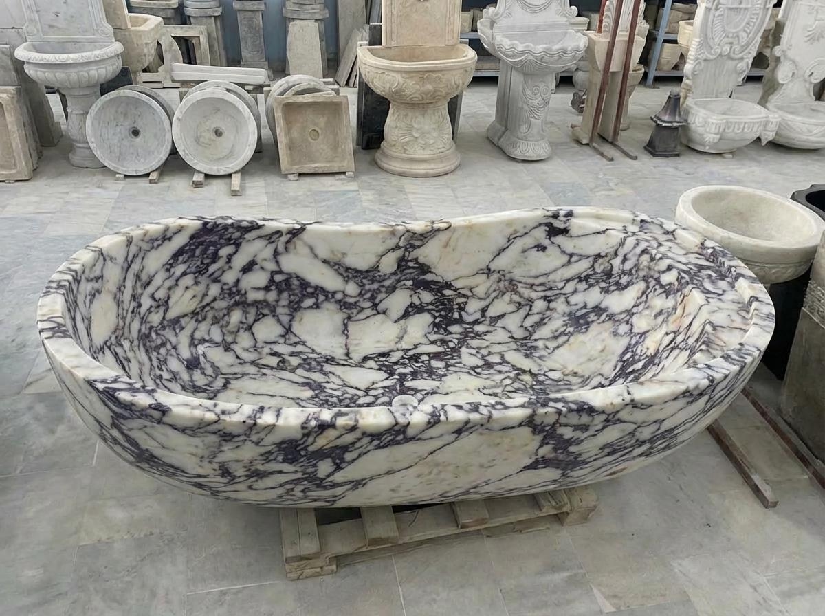 Handcarved Calacatta Viola marble freestanding bathtub by Marblyart, custom made to order — photo 12 of 13