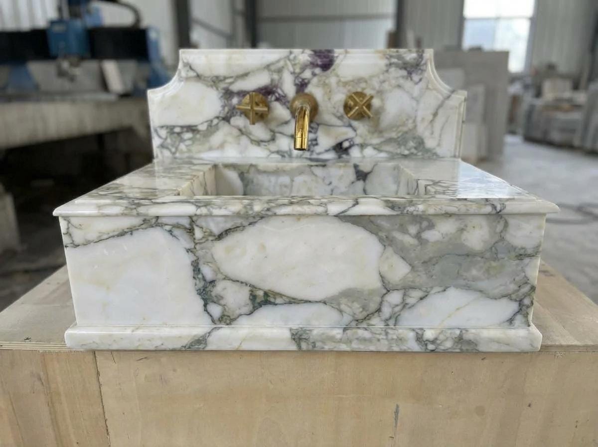 Handcarved Calacatta Monet marble wall mounted sink by Marblyart, custom made to order — photo 7 of 11