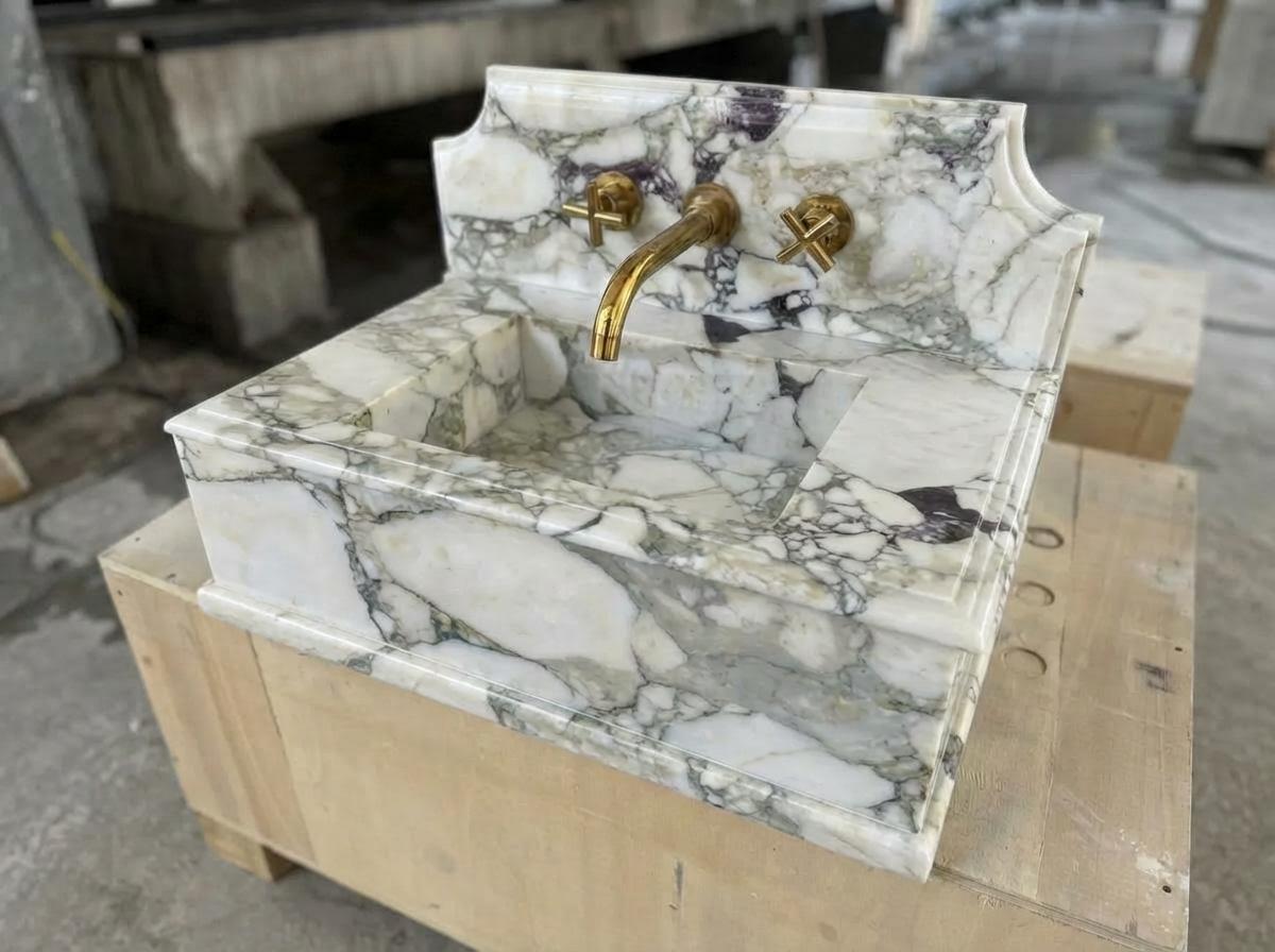 Handcarved Calacatta Monet marble wall mounted sink by Marblyart, custom made to order — photo 2 of 11