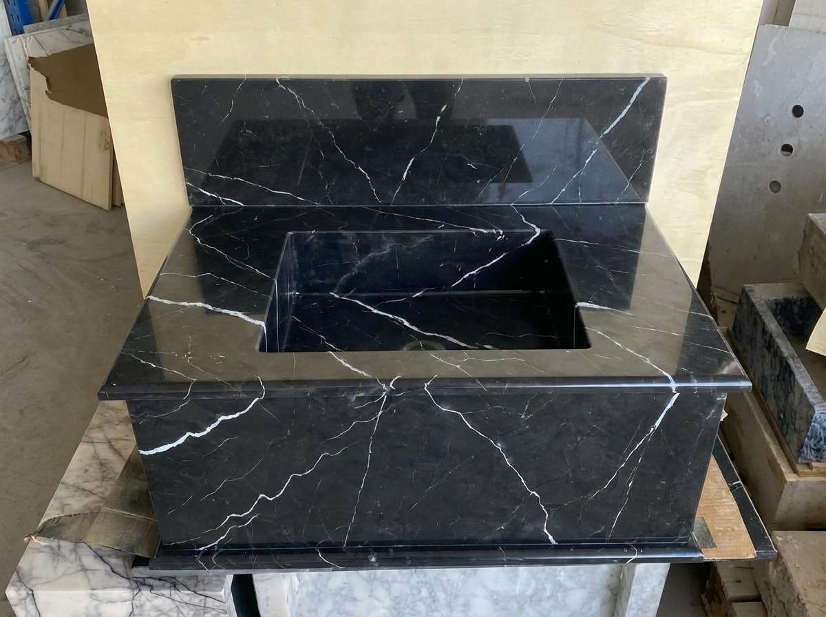 Handcarved Nero Marquina marble wall mounted sink by Marblyart, custom made to order — photo 10 of 13