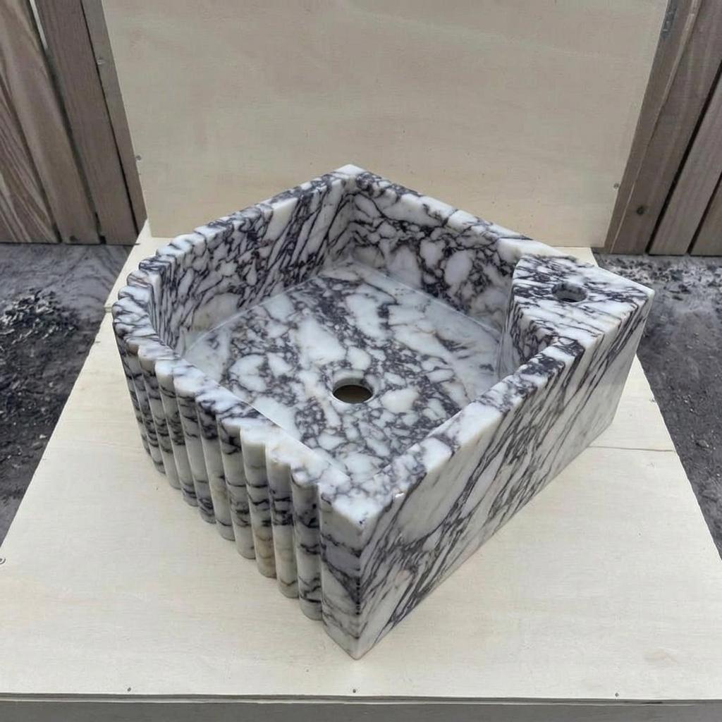 Calacatta Viola Marble fluted vessel sink — isometric three-quarter view (photo 6)