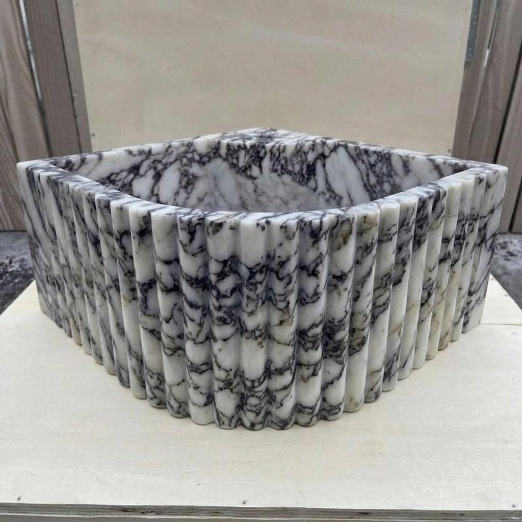 Calacatta Viola Marble fluted vessel sink — eye-level view (photo 19)