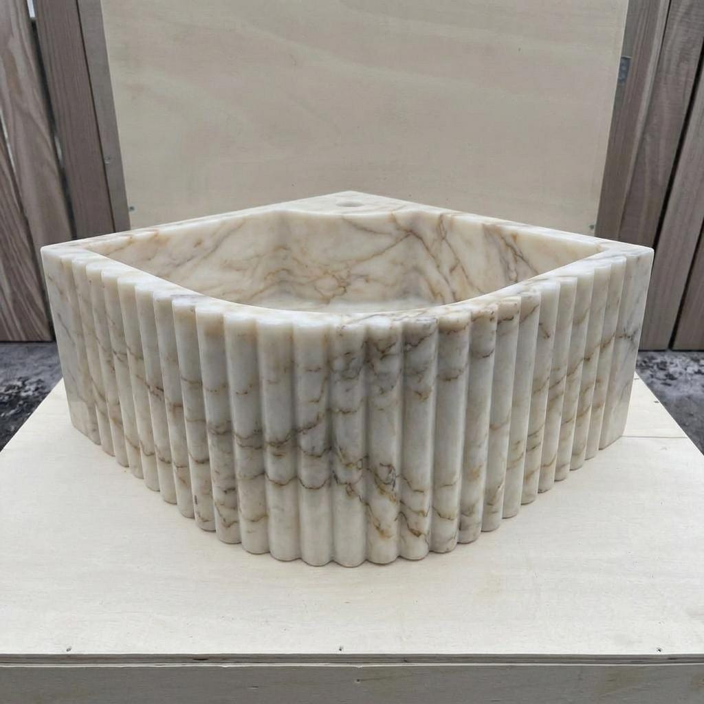 Calacatta Gold Marble fluted vessel sink — right side view (photo 4)
