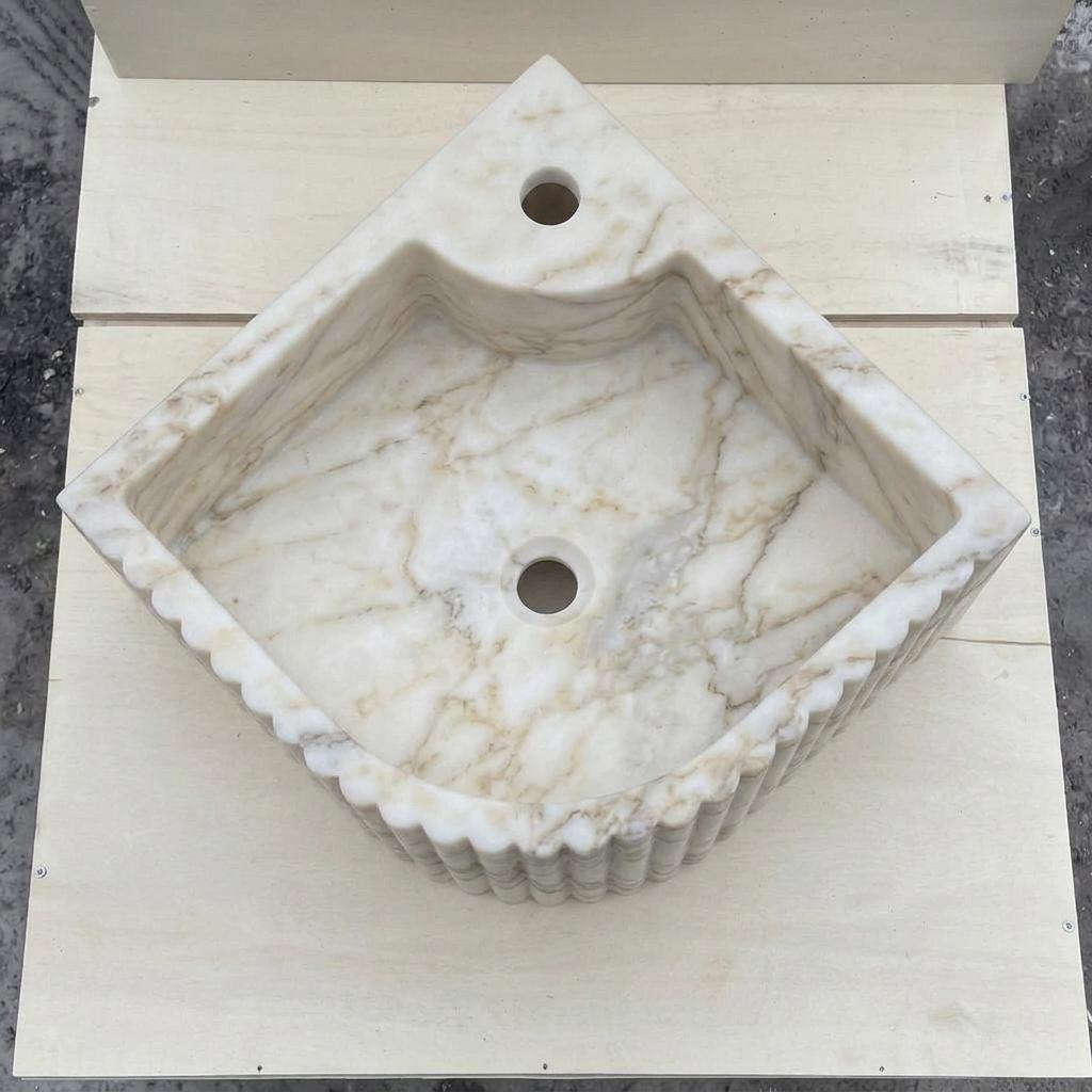 Calacatta Gold Marble fluted vessel sink — top-down view (photo 5)