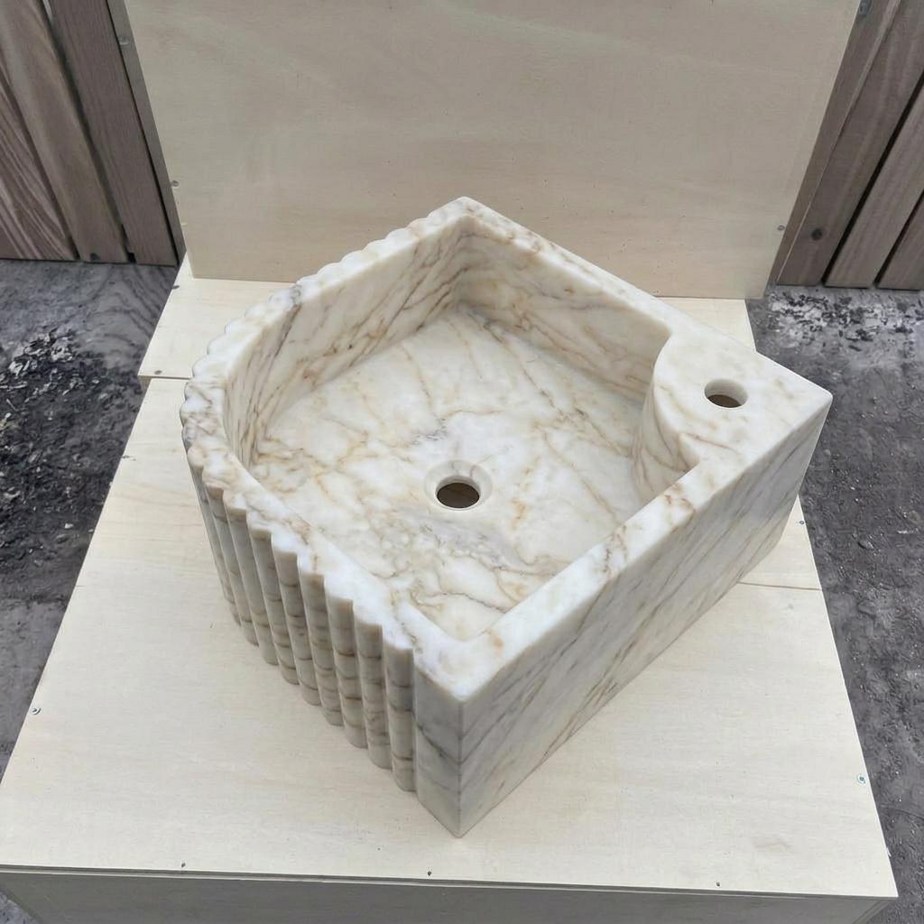 Calacatta Gold Marble fluted vessel sink — isometric three-quarter view (photo 8)