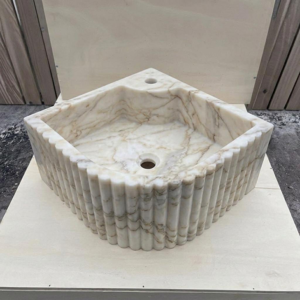 Calacatta Gold Marble fluted vessel sink — front view (photo 9)