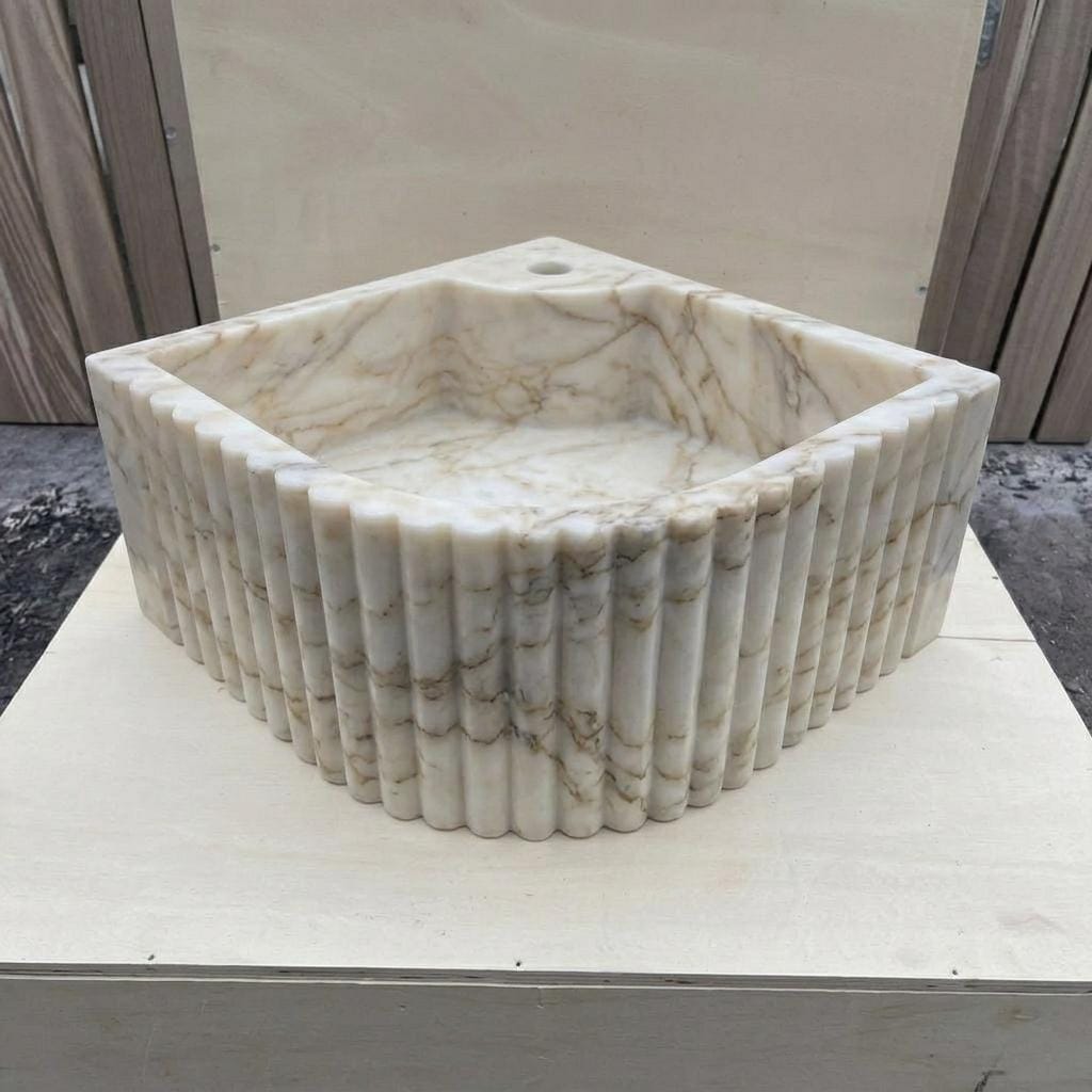 Calacatta Gold Marble fluted vessel sink — front view (photo 11)