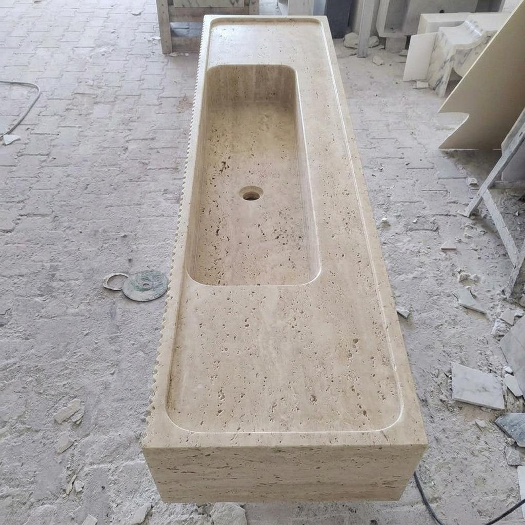Beige Travertine fluted vessel sink — top-down view (photo 4)