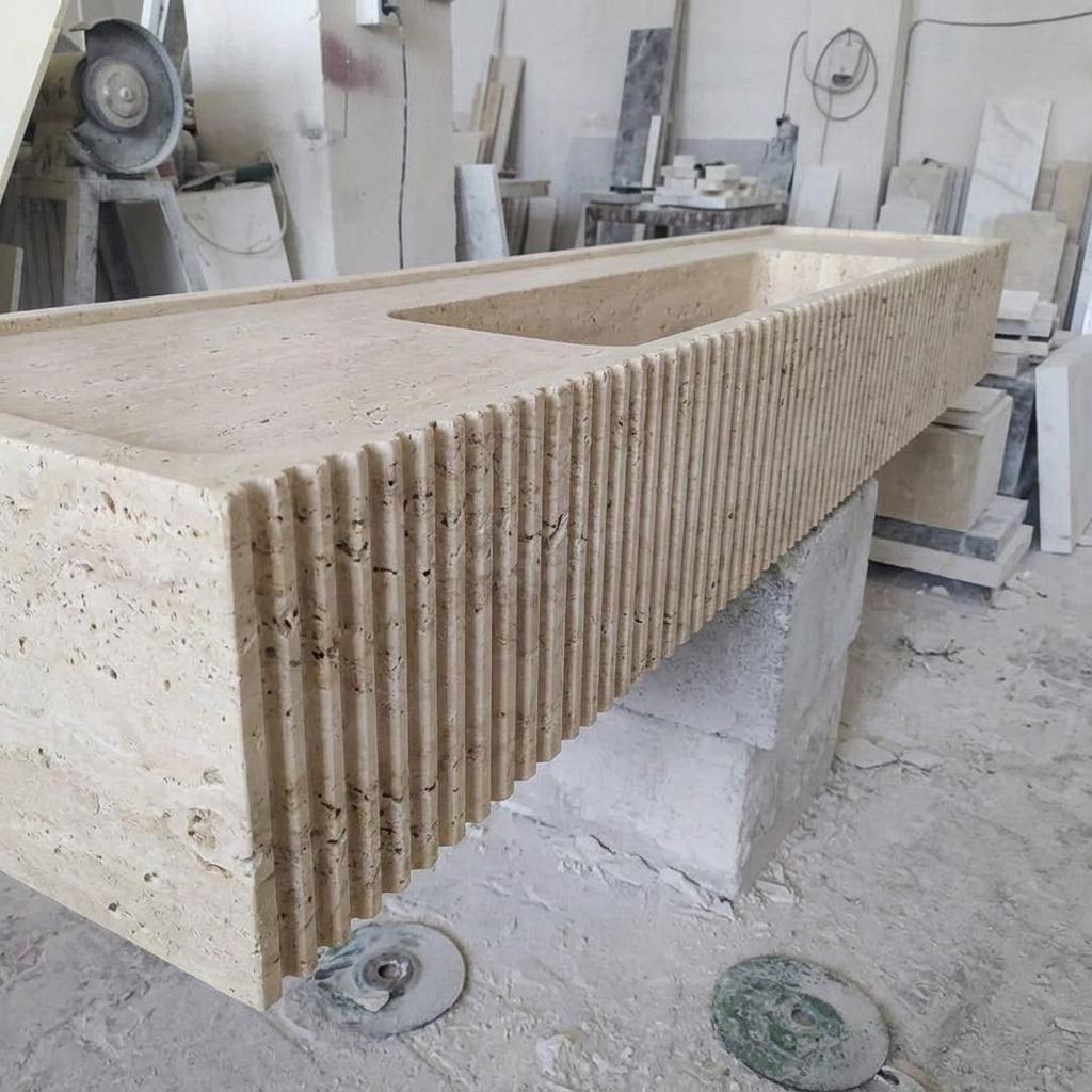Beige Travertine fluted vessel sink — low-angle view (photo 11)
