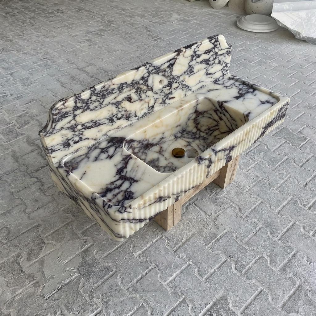 Calacatta Viola Marble fluted vessel sink — isometric three-quarter view (photo 9)