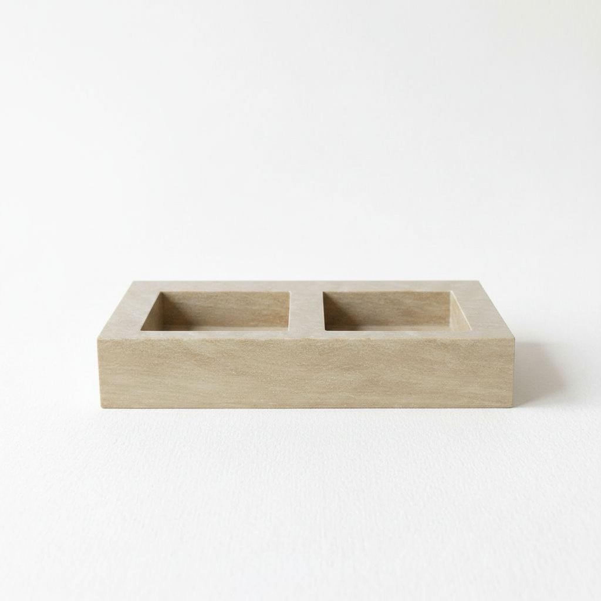 A simple, rectangular wooden tray with two empty compartments.