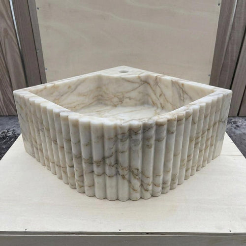 Calacatta Gold Marble fluted vessel sink — front view (photo 2)