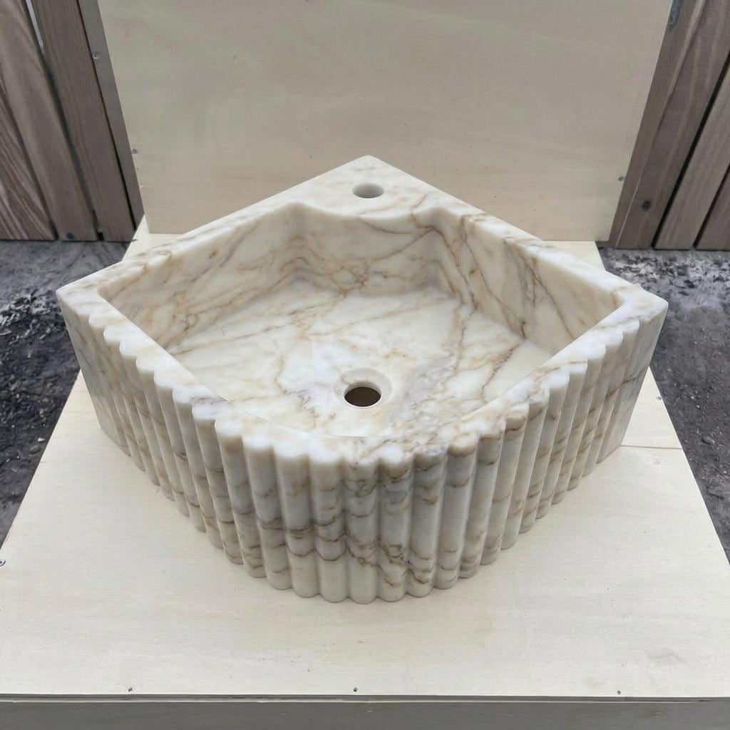 Calacatta Gold Marble fluted vessel sink — eye-level view (photo 18)
