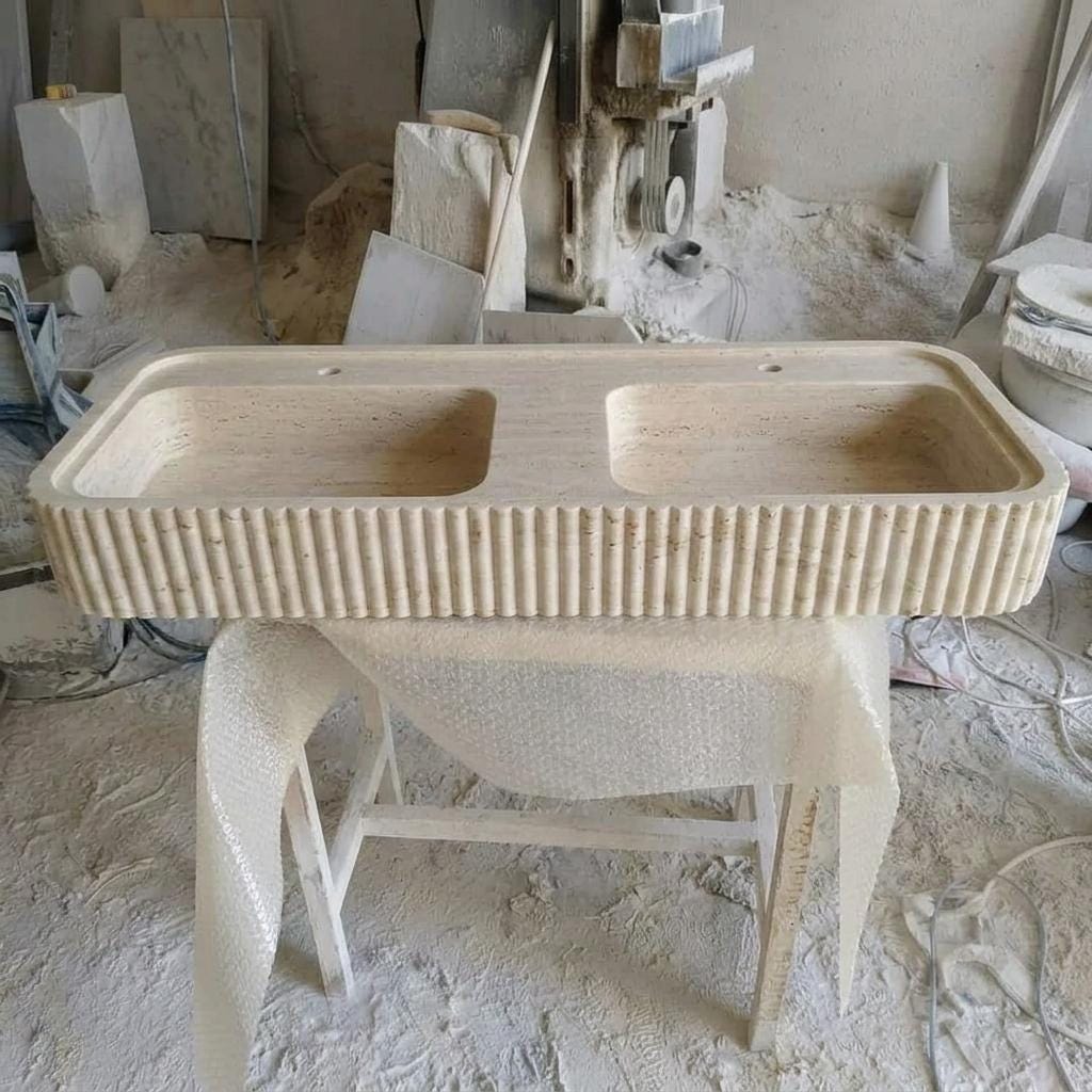 Beige Travertine fluted vessel sink — eye-level view (photo 11)