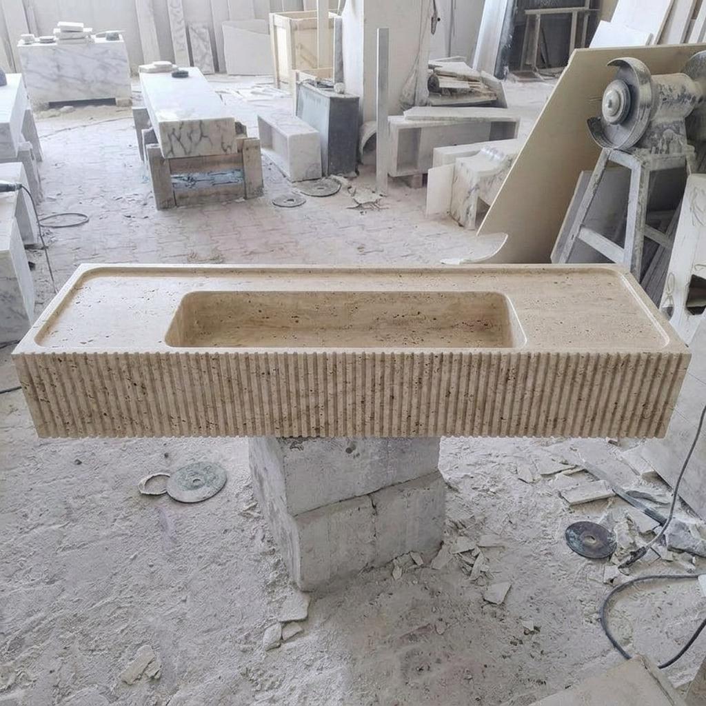 Beige Travertine fluted vessel sink — eye-level view (photo 17)
