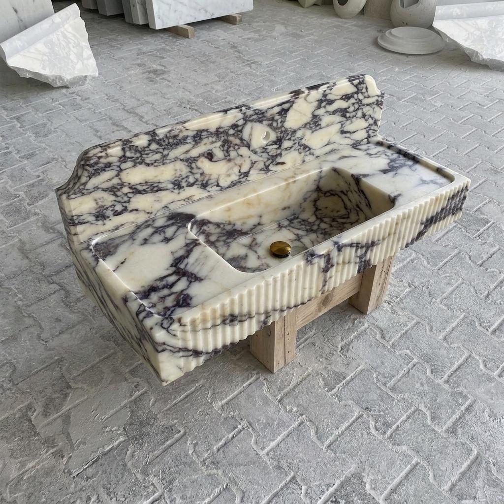 Calacatta Viola Marble fluted vessel sink — isometric three-quarter view (photo 8)