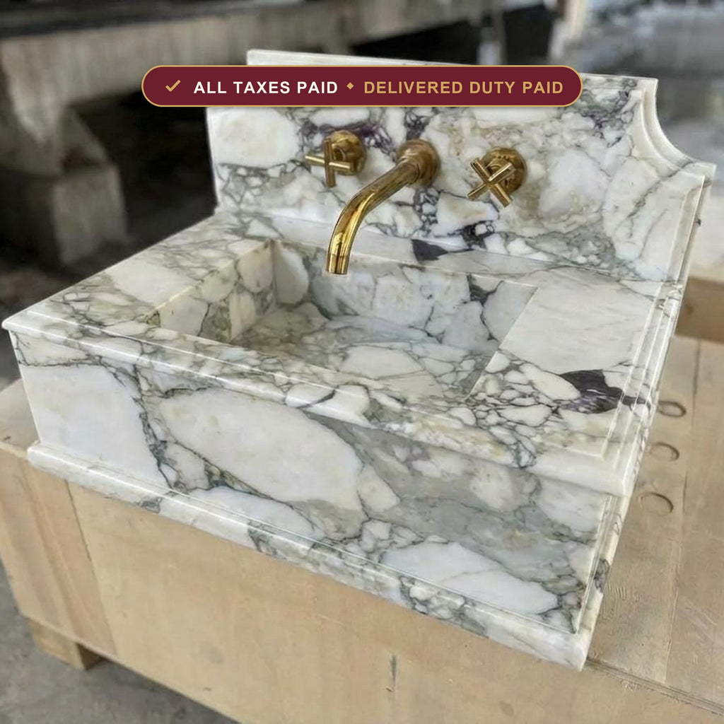 Handcarved Calacatta Monet marble wall mounted sink by Marblyart, custom made to order — photo 1 of 11