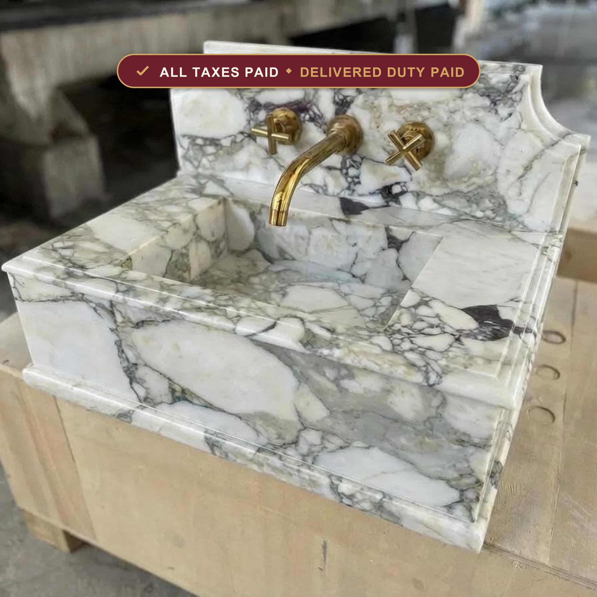 Handcarved Calacatta Monet marble wall mounted sink by Marblyart, custom made to order — photo 1 of 11