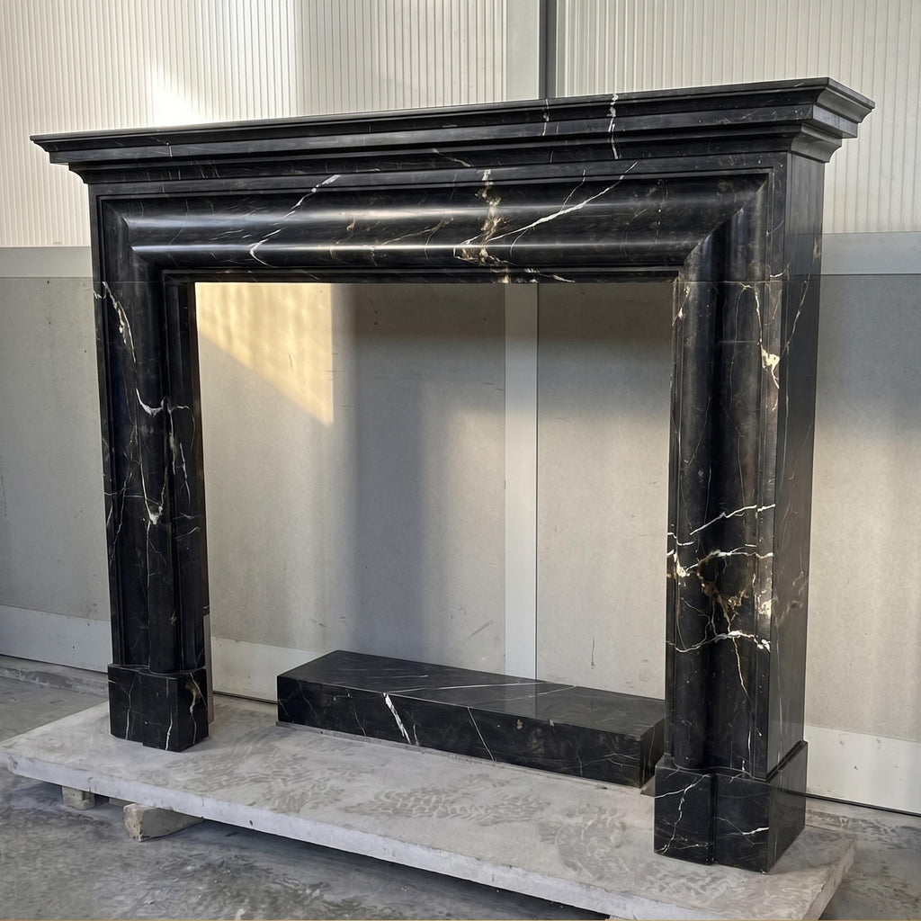 Nero Marquina bolection fireplace surround — reference
