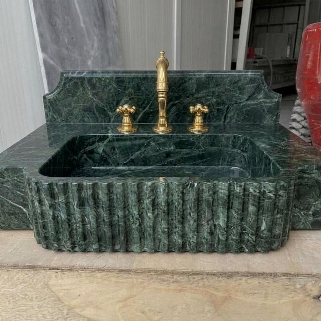 Fluted Apron Verde Marble Sink with Integrated Counter & Optional Backsplash, Artisan Made — Low angle front view