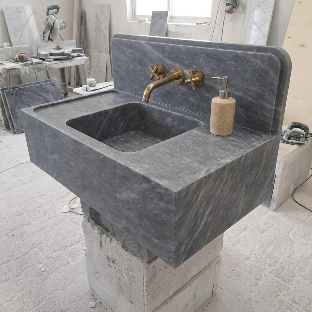 Integrated Counter Marble Sink with Backsplash | Thundra Gray | Hand Carved | Made to Orde — Isometric view from front right